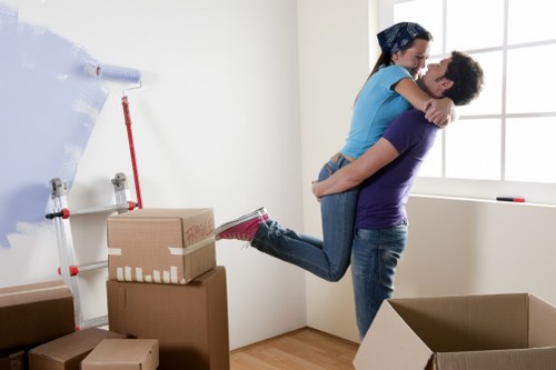 Movers loading furniture for a Shirley home relocation